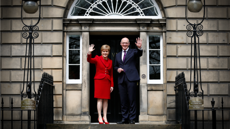 John Swinney and Nicola Sturgeon outside Bute House